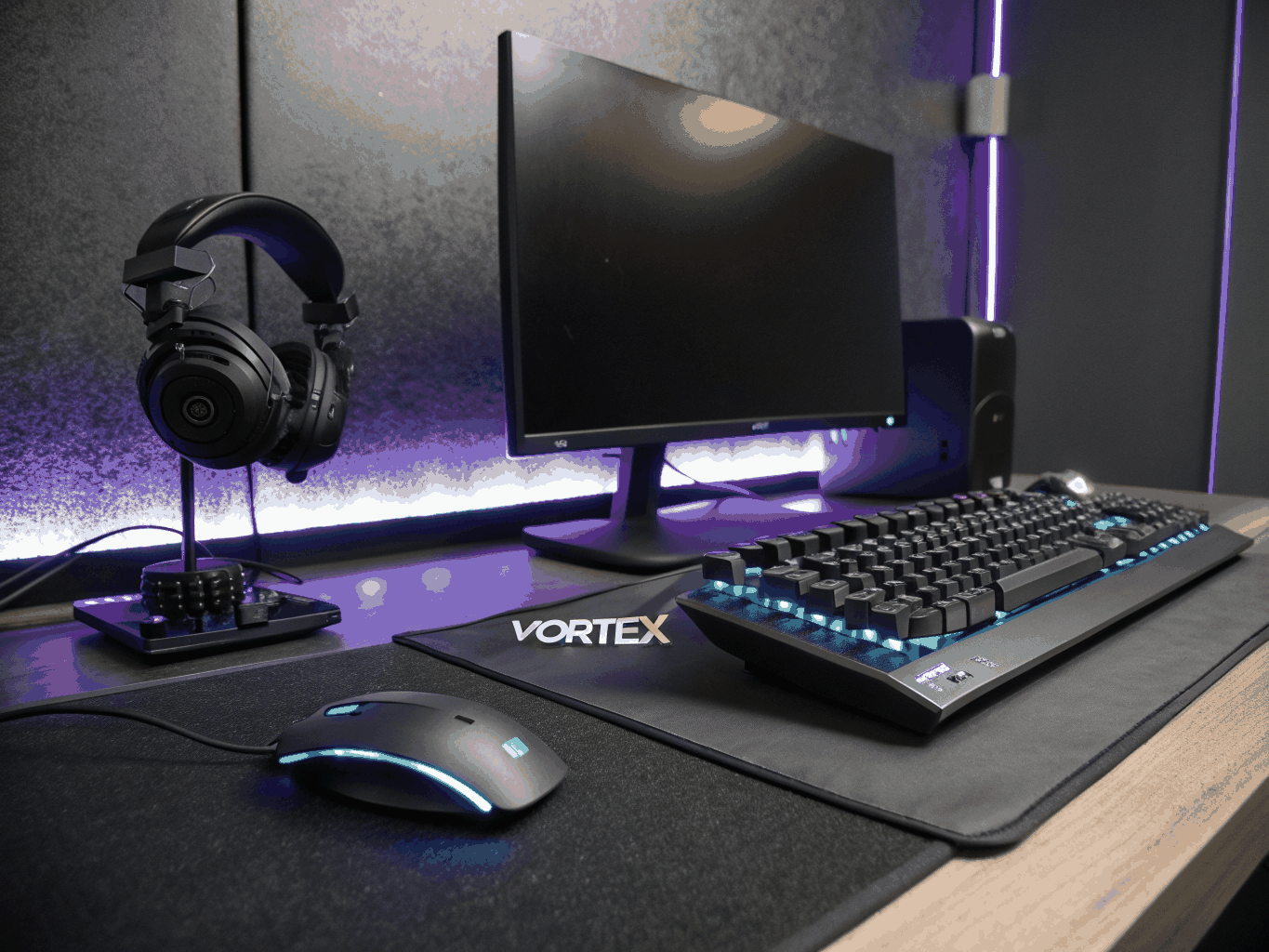 Gaming peripherals laid out on a clean tech workbench